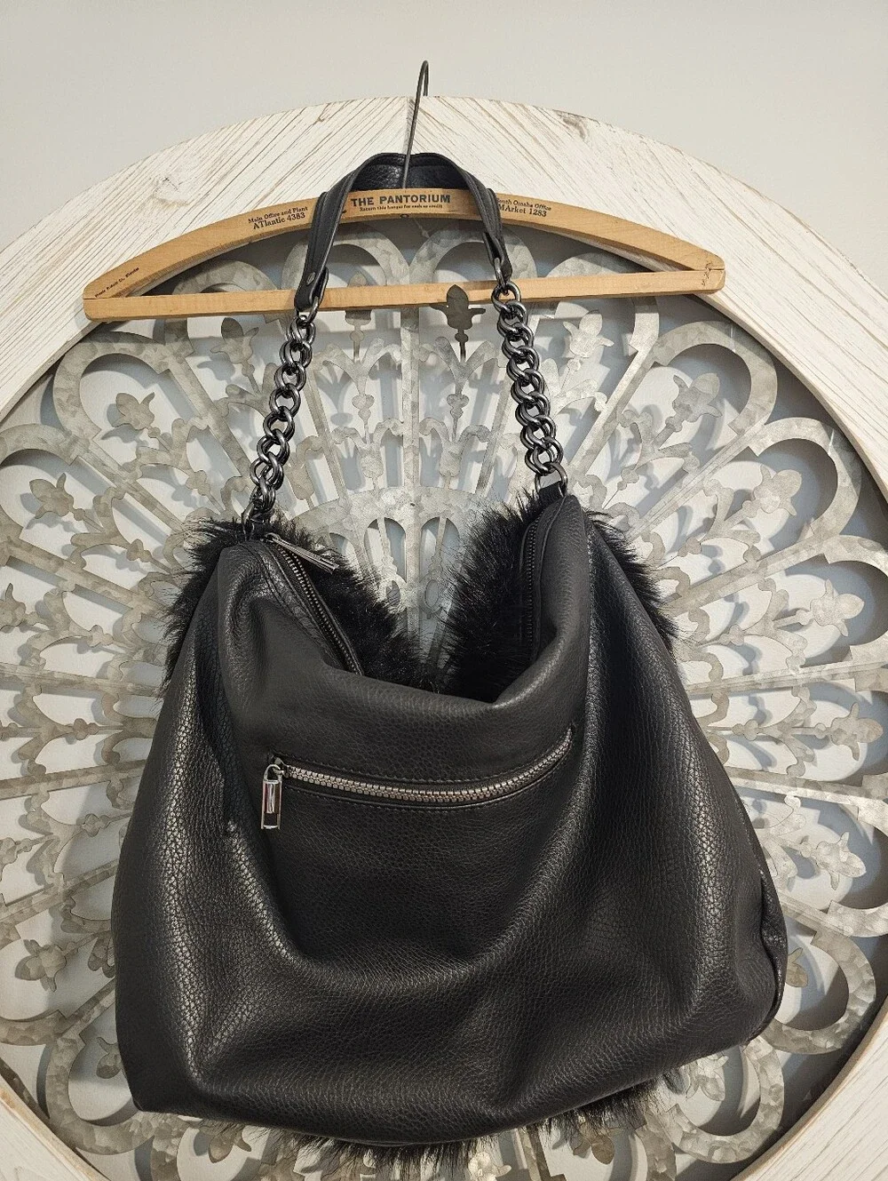 Carlos By Carlos Santana.  Black Faux Fir Bag